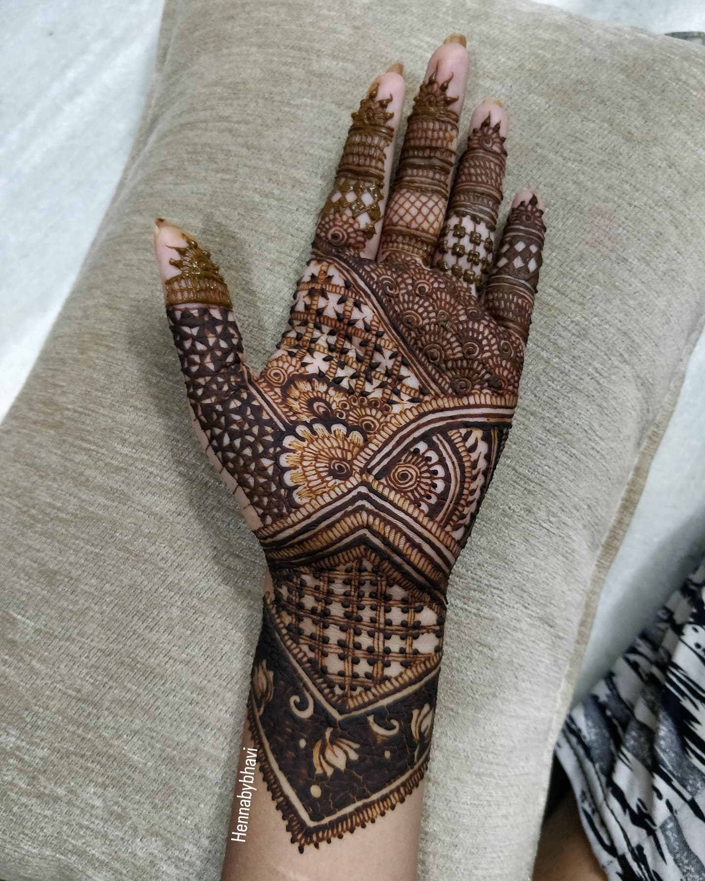 A bold geometric bridal cuff banded across the back of a hand